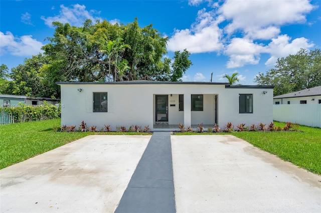 1010 NE 140th St, North Miami, FL 33161 - view of front facade with stucco siding