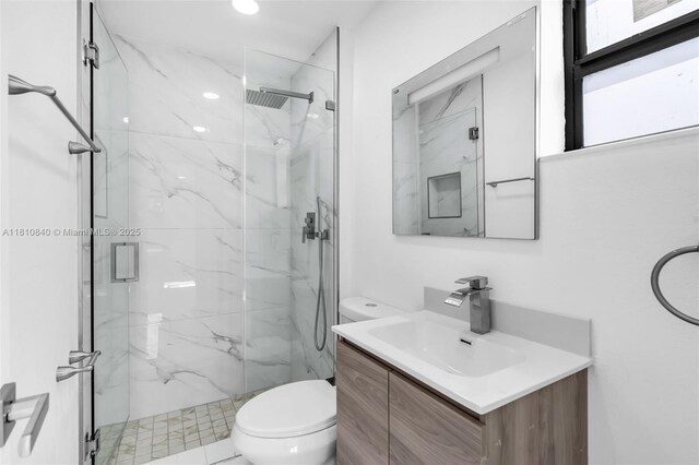 1010 NE 140th St, North Miami, FL 33161 - bathroom with toilet, a marble finish shower, and vanity