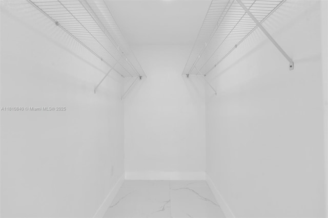 1010 NE 140th St, North Miami, FL 33161 - walk in closet with light marble finish floors