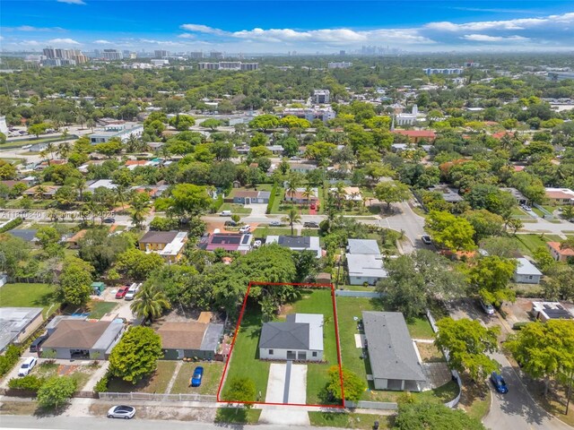 1010 NE 140th St, North Miami, FL 33161 - aerial perspective of suburban area with property parcel outlined