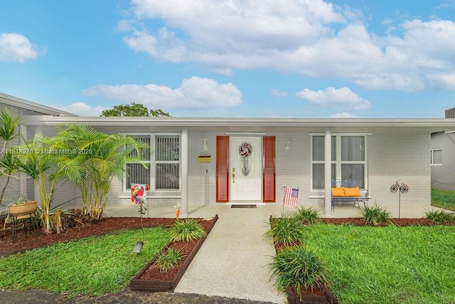 1801 N 55th Ave, Hollywood, FL 33021 - view of front of home with brick siding and covered porch