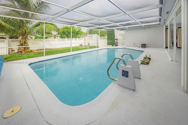 1801 N 55th Ave, Hollywood, FL 33021 - view of pool featuring a fenced backyard, a patio, and glass enclosure