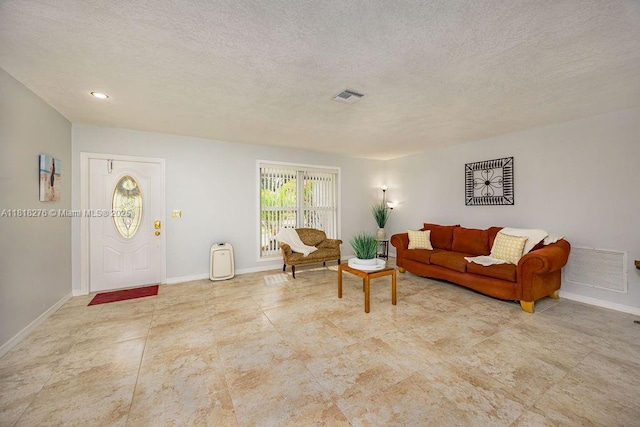1801 N 55th Ave, Hollywood, FL 33021 - living room featuring baseboards and a textured ceiling