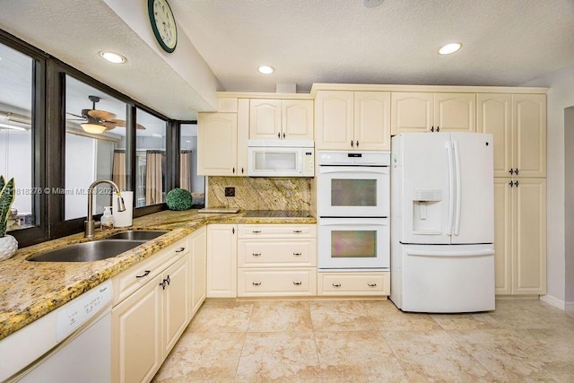 1801 N 55th Ave, Hollywood, FL 33021 - kitchen with white appliances, a sink, light stone countertops, recessed lighting, and healthy amount of natural light