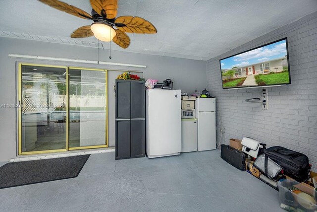 1801 N 55th Ave, Hollywood, FL 33021 - misc room with finished concrete floors, brick wall, and a ceiling fan