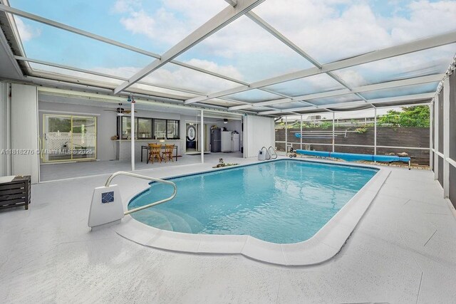 1801 N 55th Ave, Hollywood, FL 33021 - view of swimming pool featuring a covered pool, a patio, and glass enclosure
