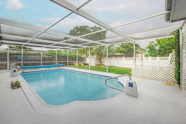 1801 N 55th Ave, Hollywood, FL 33021 - view of pool with a fenced backyard, a patio, and glass enclosure