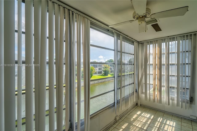 8350 Sands Point Blvd Unit E309, Tamarac, FL 33321 - unfurnished sunroom featuring a water view