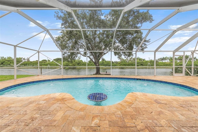 2256 SW 183rd Ter, Miramar, FL 33029 - outdoor pool with a patio, a water view, and a lanai