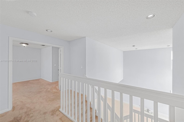 2256 SW 183rd Ter, Miramar, FL 33029 - hallway featuring carpet, a textured ceiling, and recessed lighting