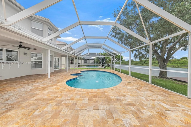 2256 SW 183rd Ter, Miramar, FL 33029 - swimming pool featuring a ceiling fan, a patio area, and glass enclosure