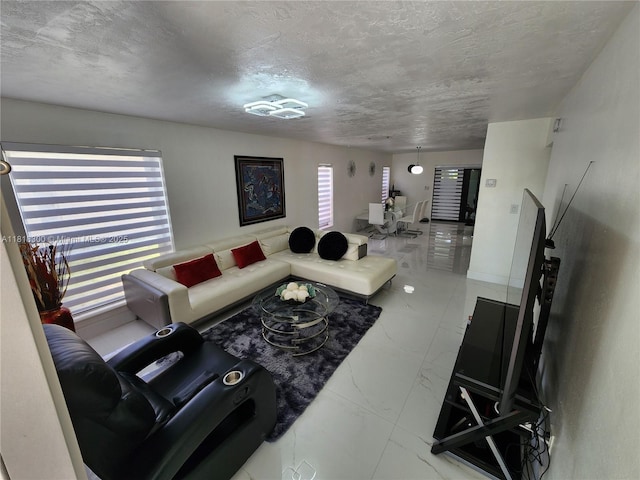 11820 SW 125th Pl Unit 11820, Miami, FL 33186 - living room featuring a textured ceiling