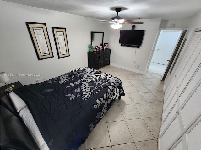 11820 SW 125th Pl Unit 11820, Miami, FL 33186 - bedroom featuring light tile patterned floors, baseboards, and a ceiling fan
