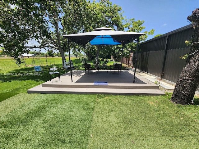 11820 SW 125th Pl Unit 11820, Miami, FL 33186 - view of property's community featuring a lawn and a wooden deck