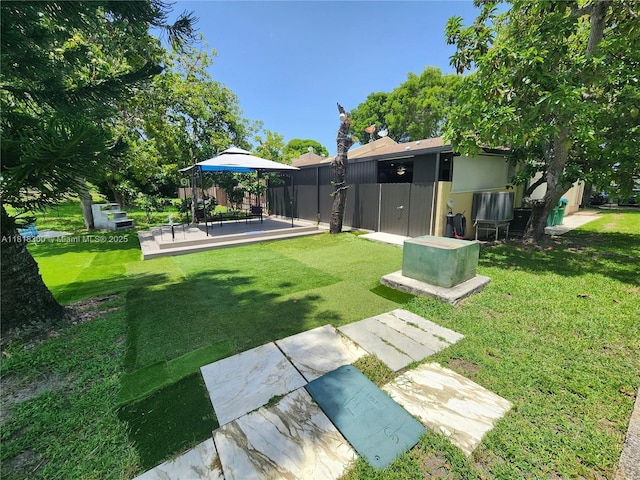 11820 SW 125th Pl Unit 11820, Miami, FL 33186 - view of yard featuring a wooden deck and a gazebo