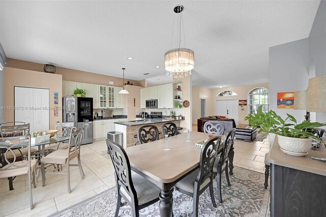 2775 Dunwoodie Pl, Homestead, FL 33035 - dining room featuring a textured ceiling, a chandelier, and recessed lighting