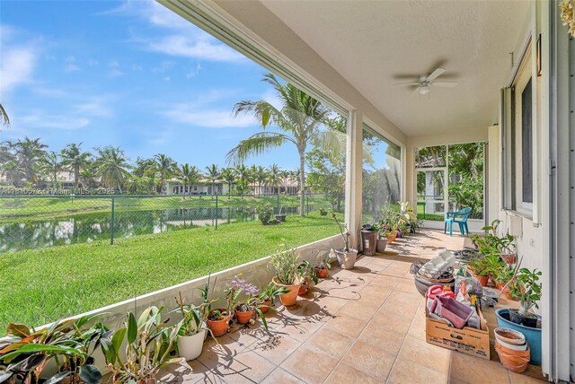 2775 Dunwoodie Pl, Homestead, FL 33035 - view of patio / terrace with a ceiling fan and a water view