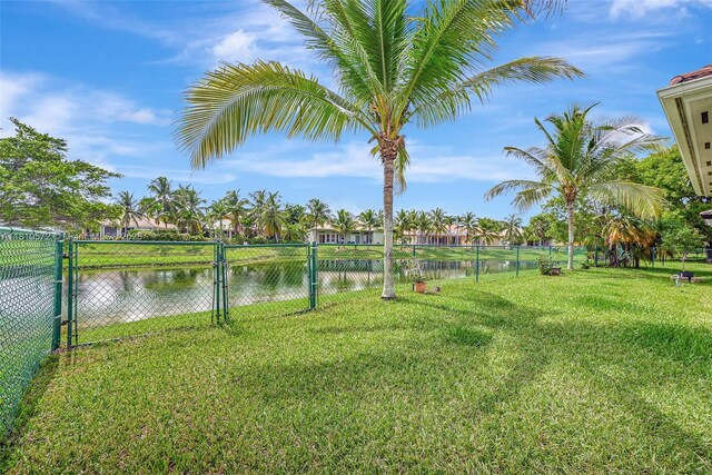 2775 Dunwoodie Pl, Homestead, FL 33035 - view of yard with a water view and a gate