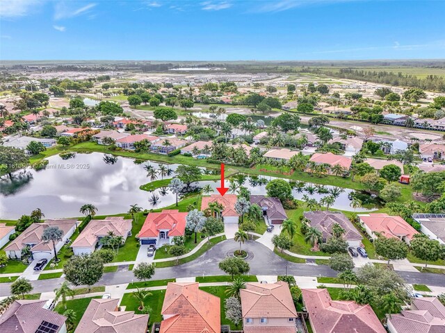 2775 Dunwoodie Pl, Homestead, FL 33035 - aerial perspective of suburban area with a nearby body of water