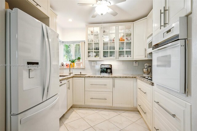1231 N 15th Ct, Hollywood, FL 33020 - dining room with light carpet and ceiling fan