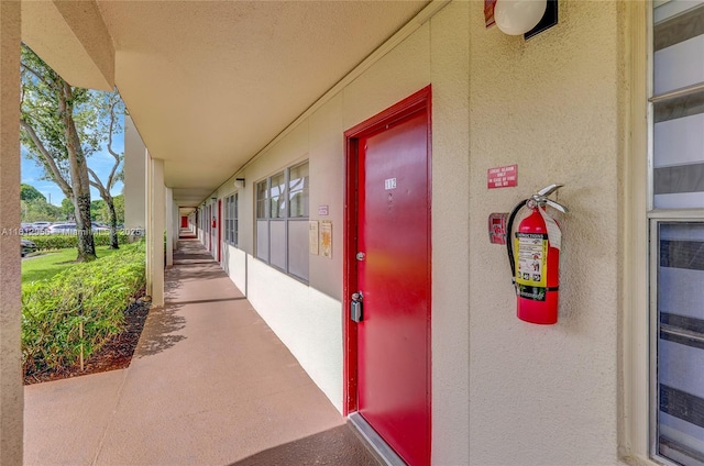 1551 SW 135th Ter Unit 112G, Pembroke Pines, FL 33027 - doorway to property featuring stucco siding and wine cooler