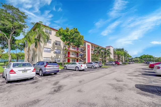 1551 SW 135th Ter Unit 112G, Pembroke Pines, FL 33027 - view of apartment building / complex featuring uncovered parking