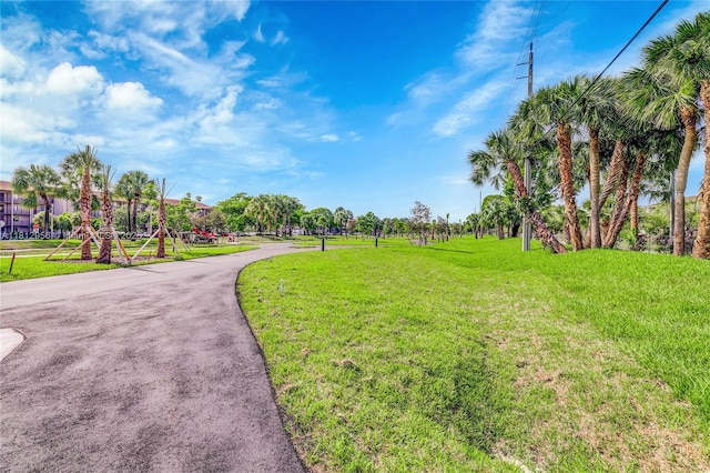 1551 SW 135th Ter Unit 112G, Pembroke Pines, FL 33027 - surrounding community with a lawn