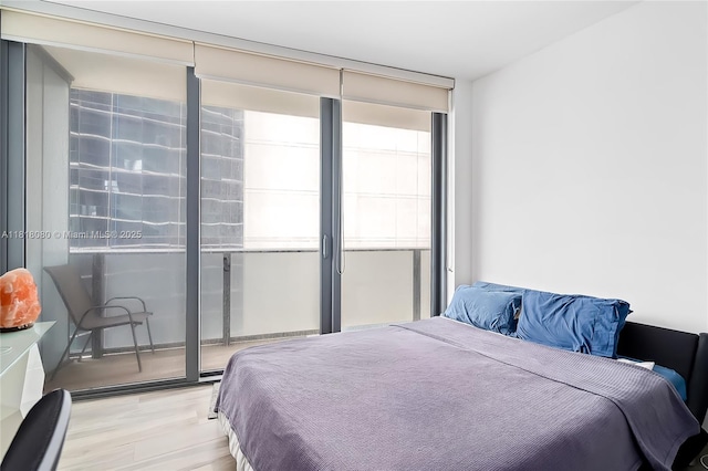 801 S Miami Ave Unit 3704, Miami, FL 33130 - bedroom with light wood finished floors
