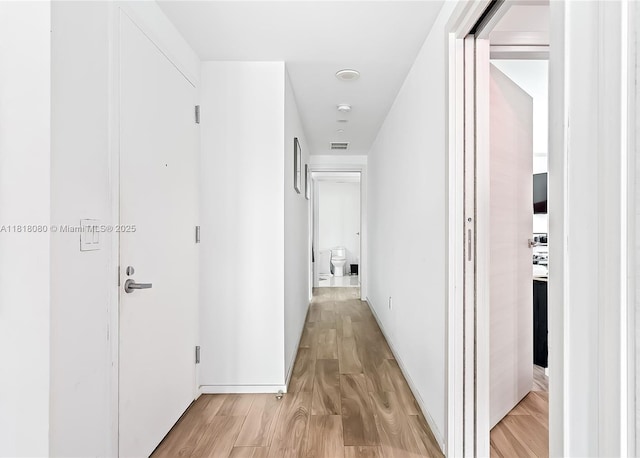 801 S Miami Ave Unit 3704, Miami, FL 33130 - hallway featuring light wood-style flooring