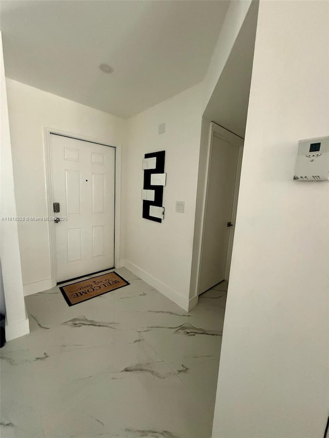 14085 SW 179th Ter, Miami, FL 33177 - entrance foyer with light marble finish floors and baseboards