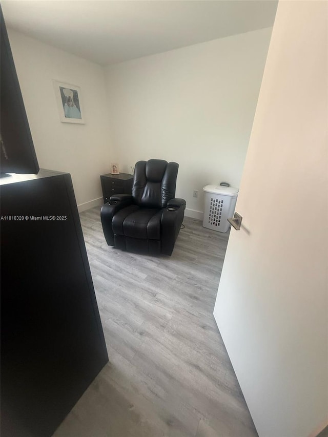 14085 SW 179th Ter, Miami, FL 33177 - living room with wood finished floors and baseboards