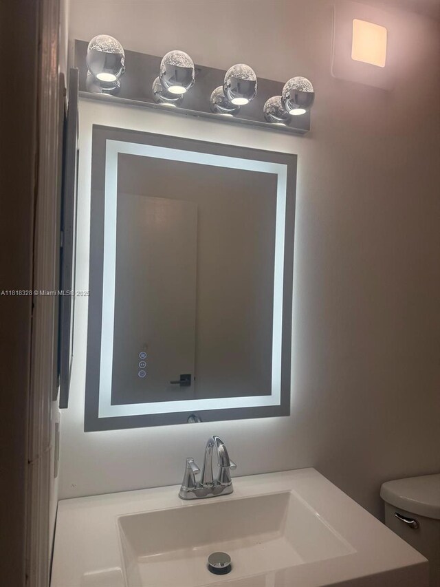 14085 SW 179th Ter, Miami, FL 33177 - bathroom featuring vanity and toilet