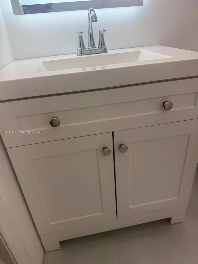 14085 SW 179th Ter, Miami, FL 33177 - bathroom with vanity and tile patterned flooring