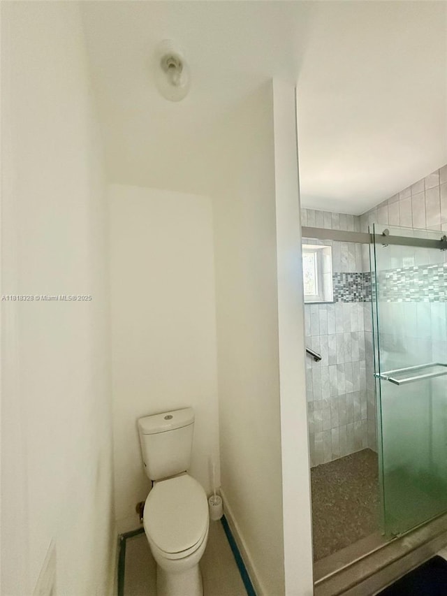 14085 SW 179th Ter, Miami, FL 33177 - full bathroom with a shower stall and toilet