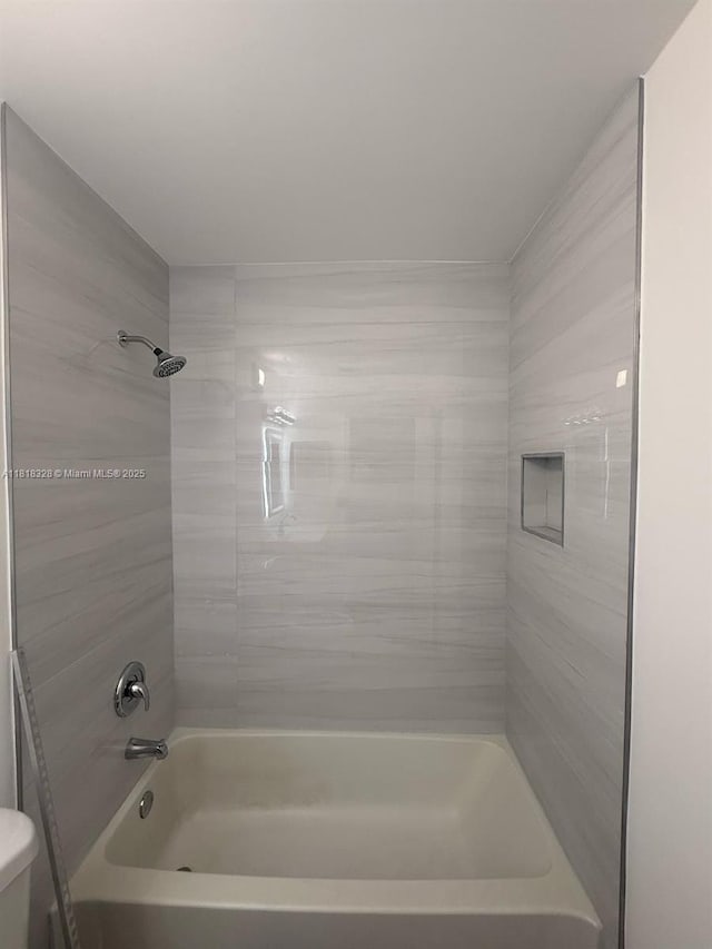 14085 SW 179th Ter, Miami, FL 33177 - bathroom featuring shower / bathtub combination and toilet
