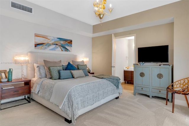 3737 Collins Ave Unit S-403, Miami Beach, FL 33140 - carpeted bedroom with a chandelier and connected bathroom