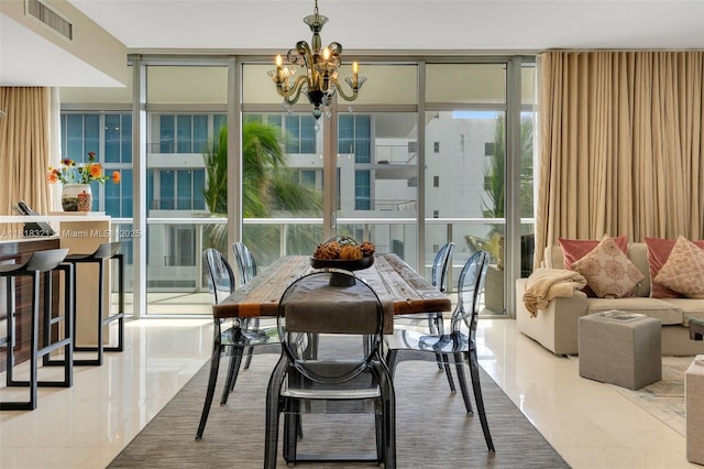 3737 Collins Ave Unit S-403, Miami Beach, FL 33140 - tiled dining space with floor to ceiling windows and a chandelier