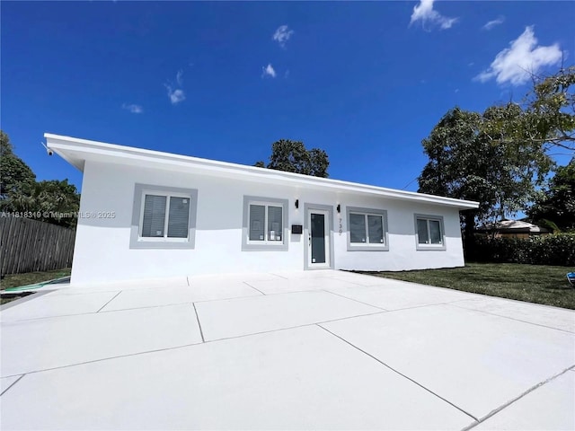 730 Alabama Ave, Fort Lauderdale, FL 33312 - view of front of house with stucco siding and a patio