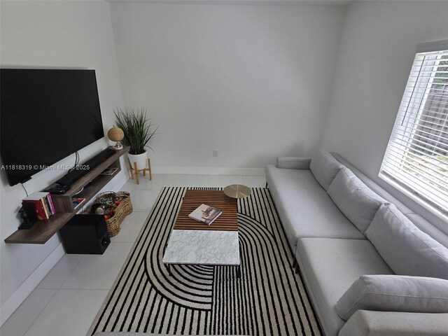 730 Alabama Ave, Fort Lauderdale, FL 33312 - tiled living room with baseboards