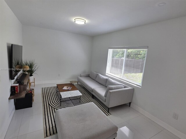 730 Alabama Ave, Fort Lauderdale, FL 33312 - living area with light tile patterned flooring