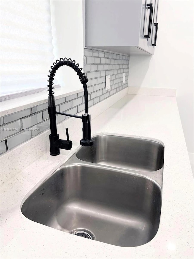 730 Alabama Ave, Fort Lauderdale, FL 33312 - kitchen view of a sink and backsplash
