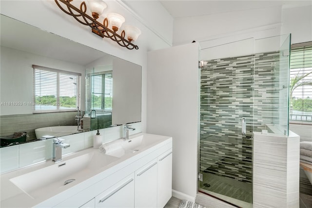 17805 NW 21st St, Pembroke Pines, FL 33029 - full bathroom with double vanity, healthy amount of natural light, a shower stall, and a freestanding tub