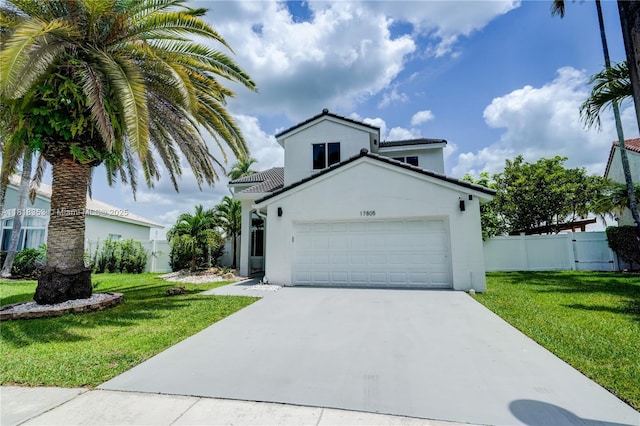 17805 NW 21st St, Pembroke Pines, FL 33029 - view of front facade with stucco siding, a garage, concrete driveway, and a tiled roof