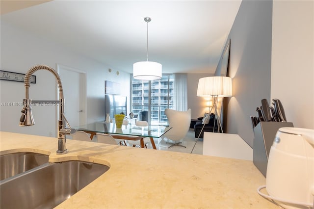 475 Brickell Ave Unit 4511, Miami, FL 33131 - kitchen with pendant lighting and light countertops