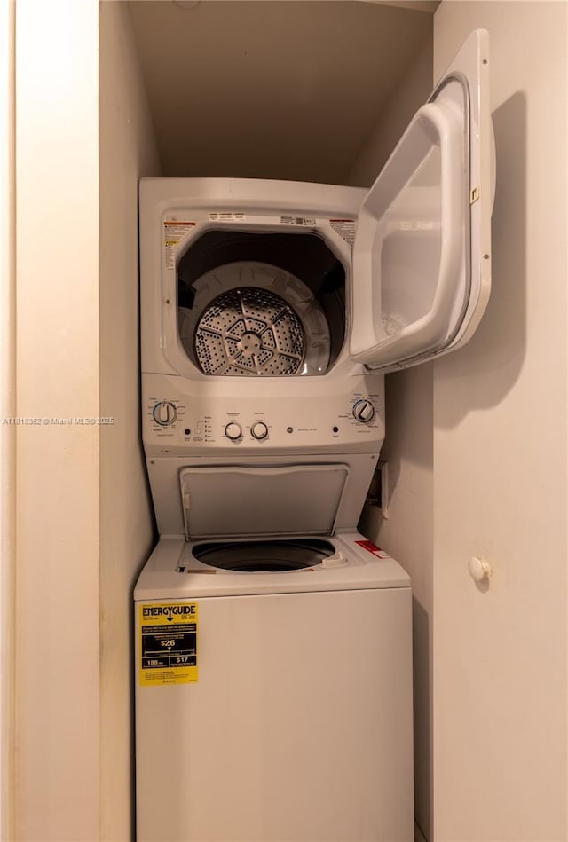 475 Brickell Ave Unit 4511, Miami, FL 33131 - laundry area with stacked washer / drying machine