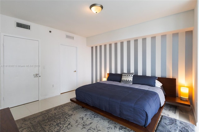 475 Brickell Ave Unit 4511, Miami, FL 33131 - bedroom featuring wallpapered walls and tile patterned floors
