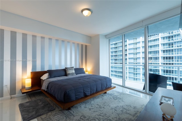 475 Brickell Ave Unit 4511, Miami, FL 33131 - bedroom featuring access to exterior and wallpapered walls
