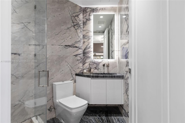 17901 Collins Ave Unit 1903, Sunny Isles Beach, FL 33160 - bathroom with marble tiled floors, vanity, toilet, a marble finish shower, and tile walls