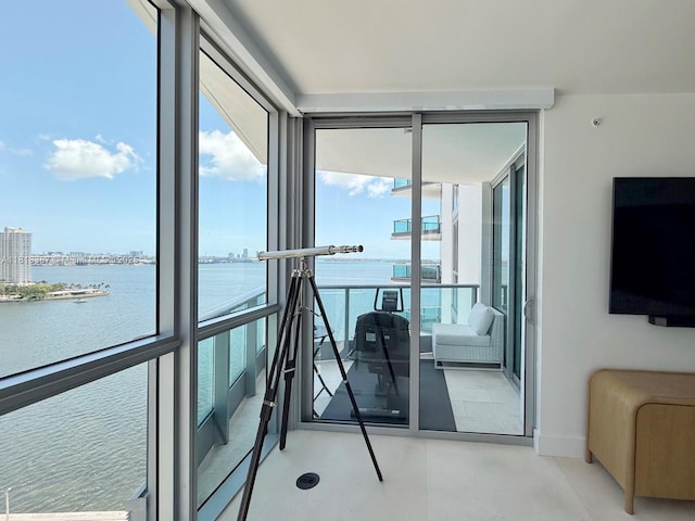 1331 Brickell Bay Dr Unit 2002, Miami, FL 33131 - sunroom with plenty of natural light, a water view, and a city view