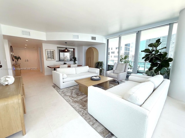 1331 Brickell Bay Dr Unit 2002, Miami, FL 33131 - living room featuring arched walkways